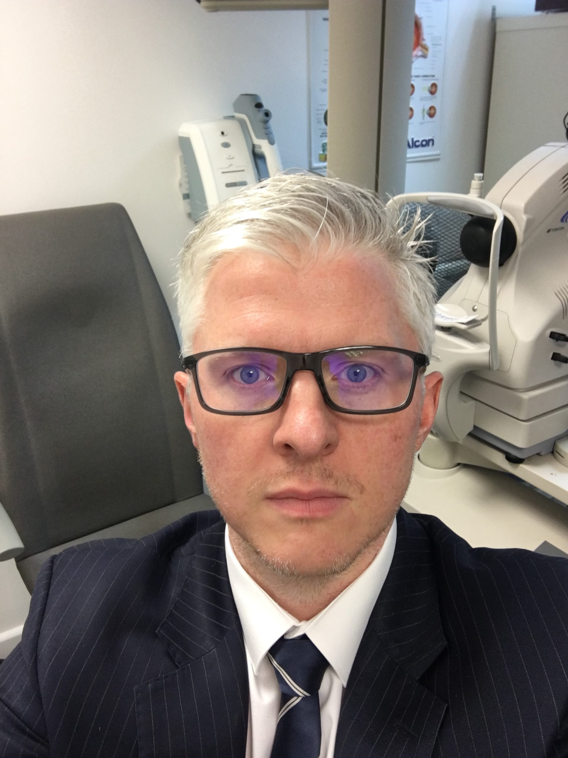 Keith Lutton, Principal Optometrist, in the consulting room